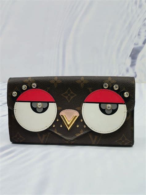 louis vuitton owl wallet price|Louis Vuitton wallet cost.